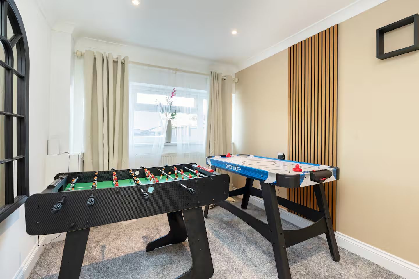 Games room in an Open Mind Property group home